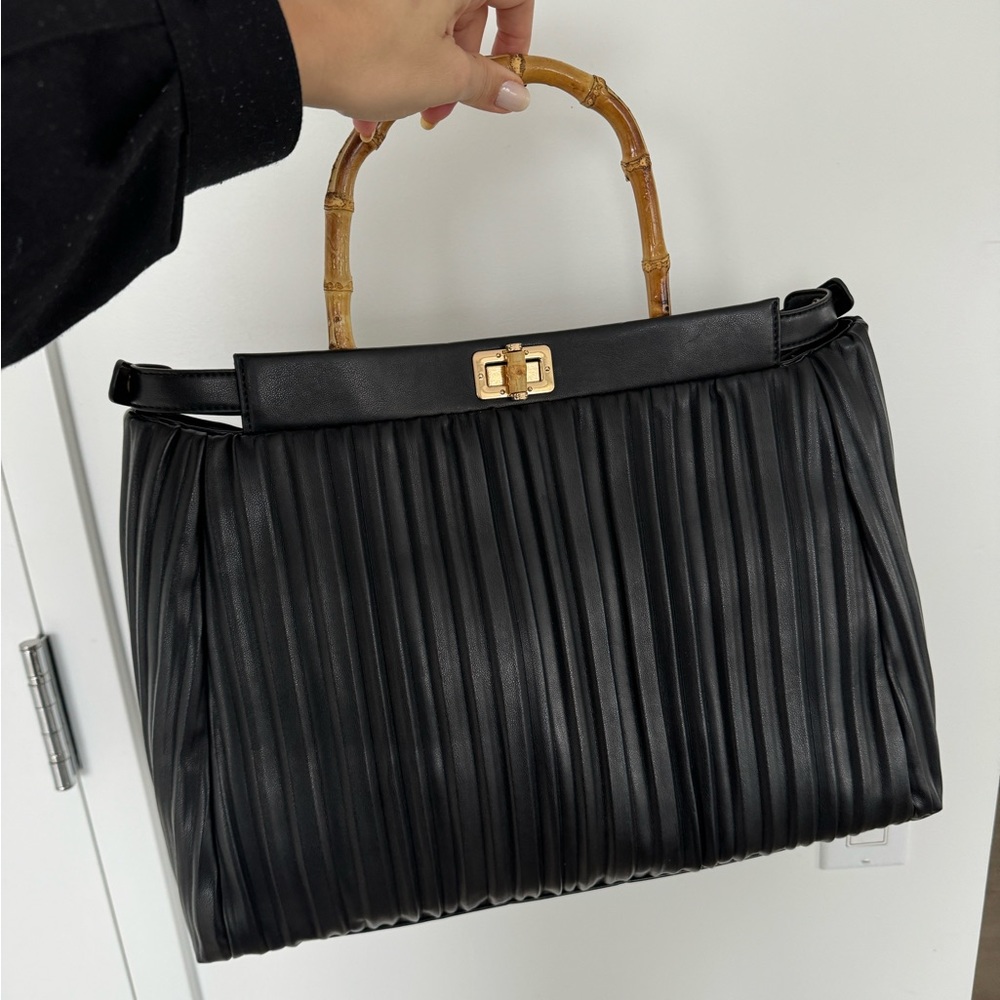Black pleather purse with bamboo handle